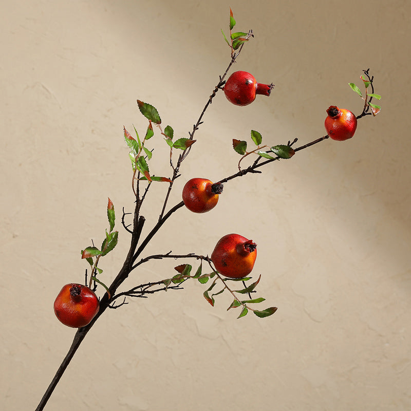 Branche de grenade artificielle dans un vase en grès à col étroit - 25,5"