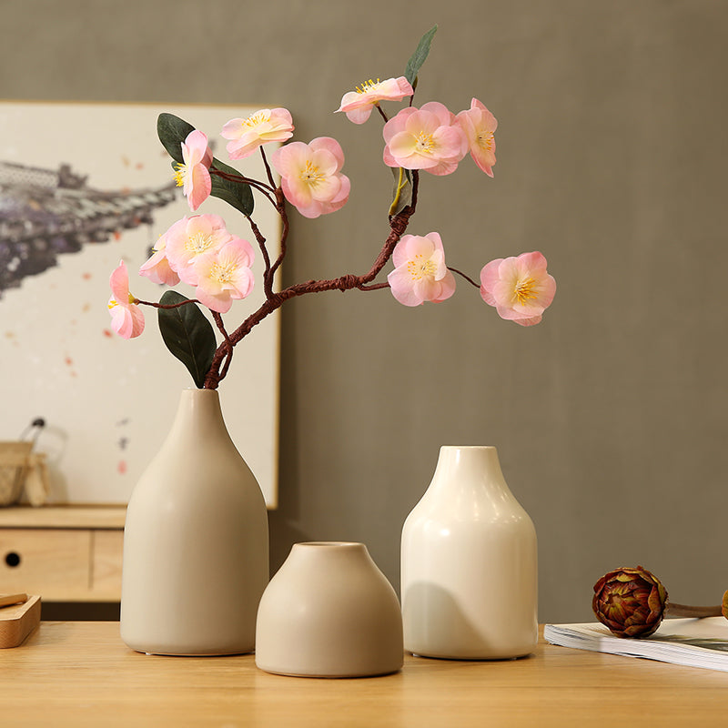 Composizione di fiori artificiali di pesca rosa in vaso grigio - 17.5"