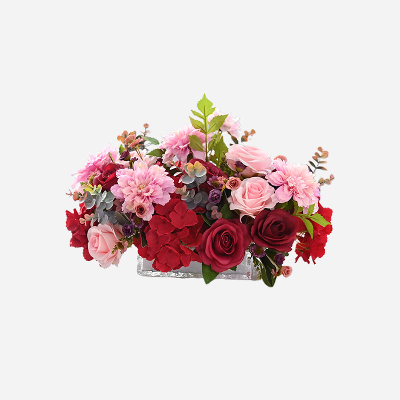 Centre de table en fausses fleurs avec roses rouges et roses, œillet, hortensia et feuilles d&
