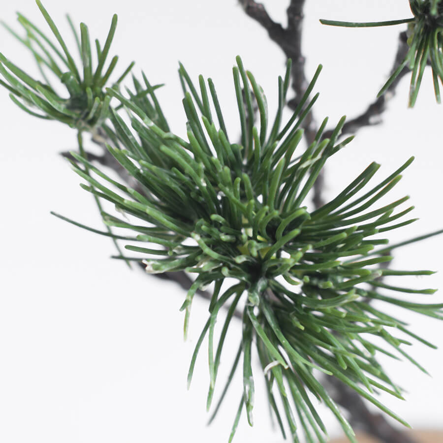 Close-up of artificial pine needles showing realistic texture and natural green color