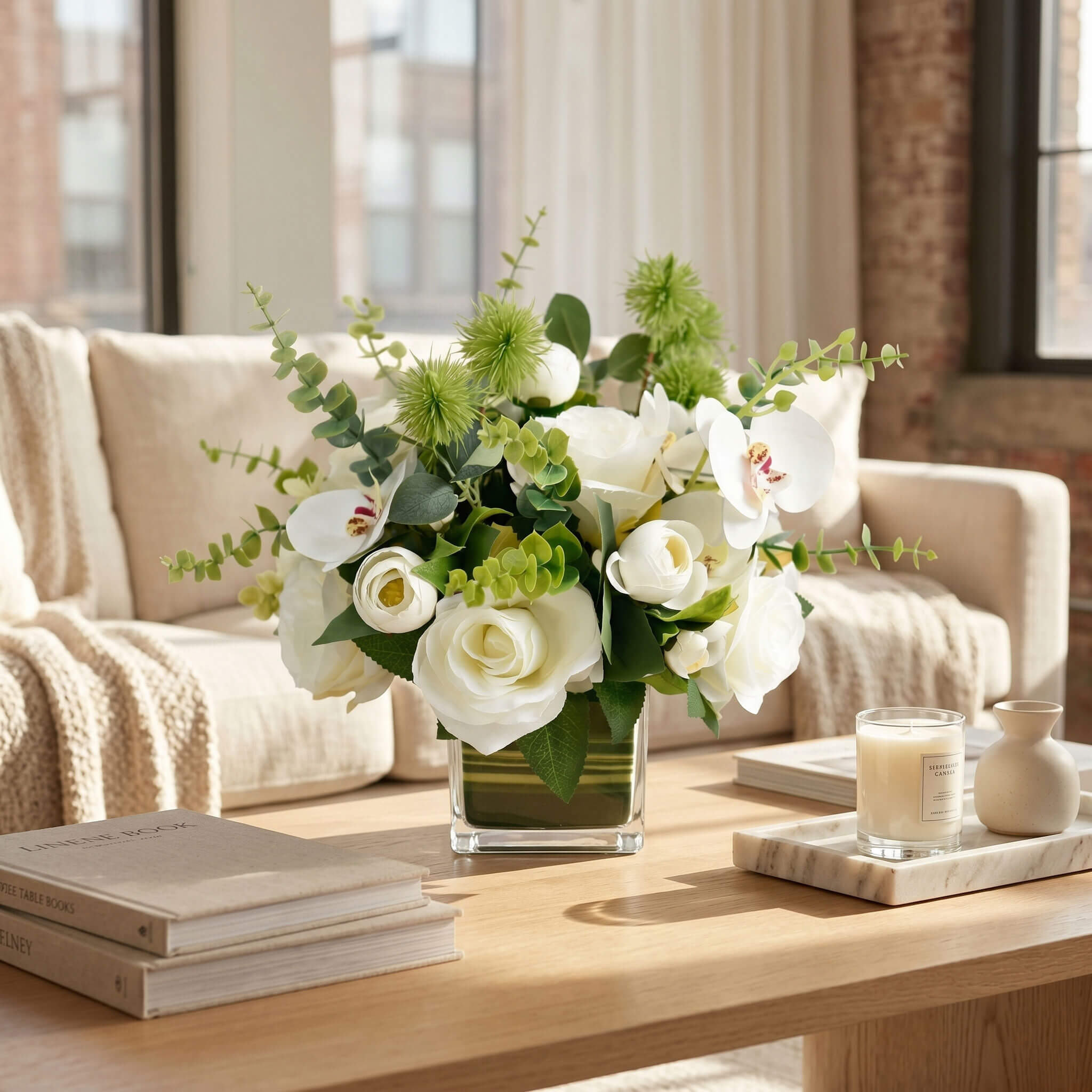 Orchid and rose floral centerpiece displayed on a living room coffee table, adding color, texture, and elegance to the seating area.