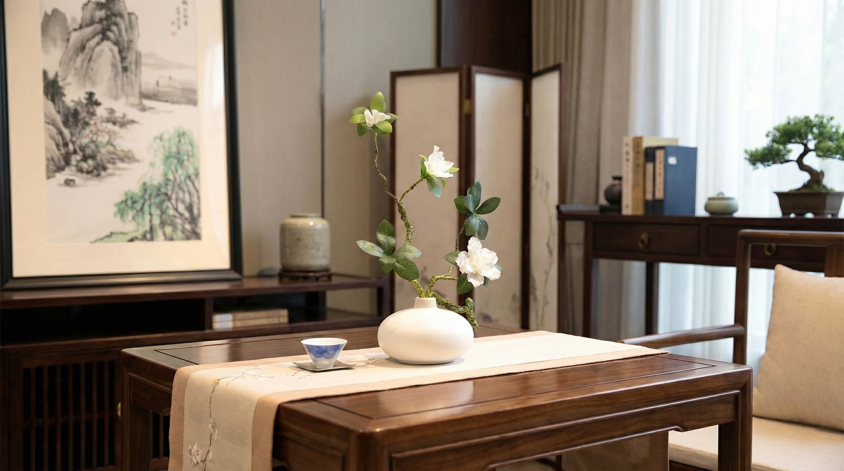 Eastern-inspired floral arrangement in a softly lit living room, creating a calm and relaxed home atmosphere