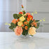 Orange artificial peony and rose floral centerpiece with chrysanthemum