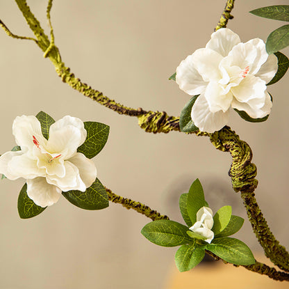 Close-up detail of faux azalea flowers, highlighting fine petal texture and realistic craftsmanship.