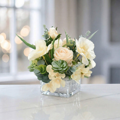 Champagne faux rose and hydrangea flower centerpiece with succulent