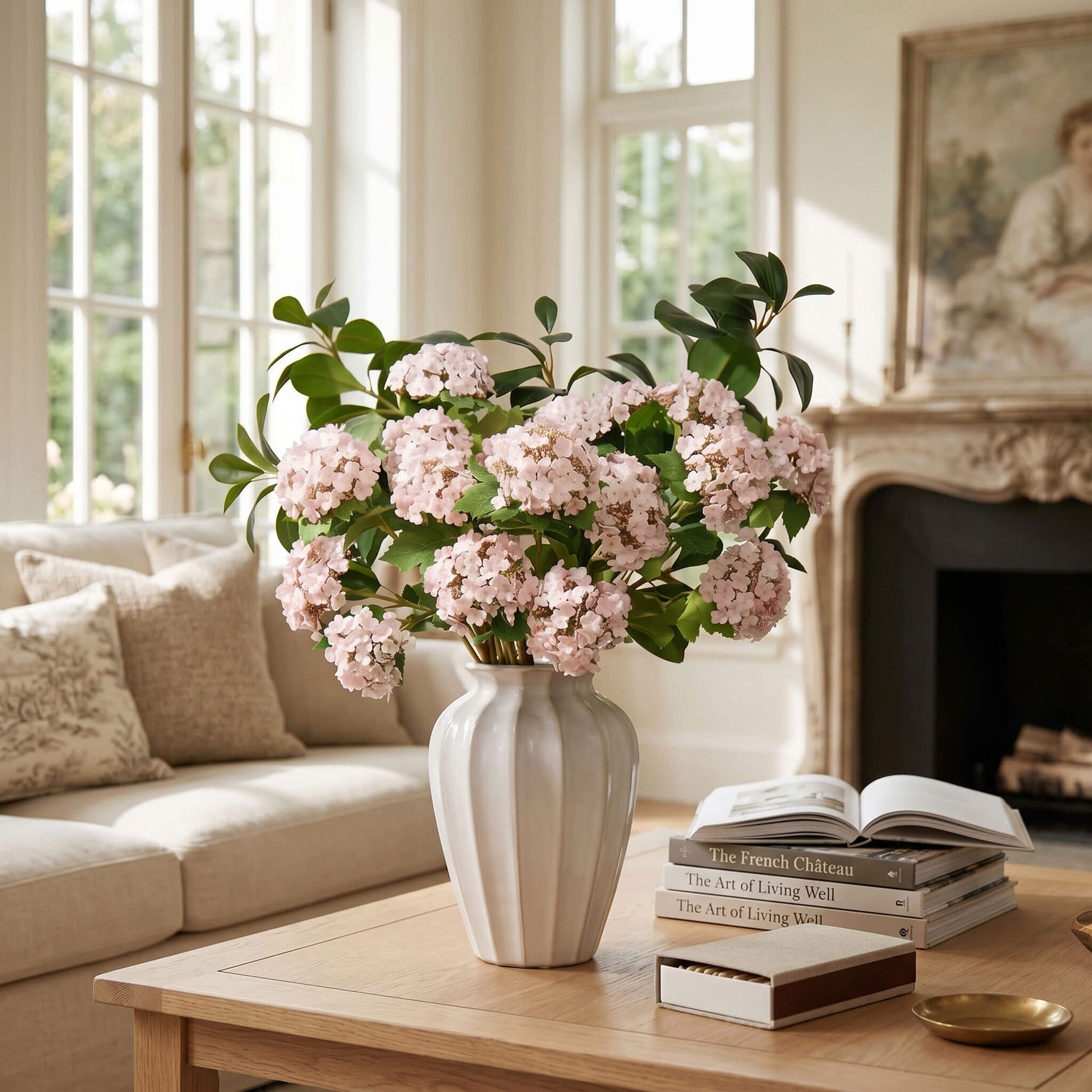 Pink hydrangea arrangement displayed on a living room coffee table, adding a fresh and welcoming focal point to the space.
