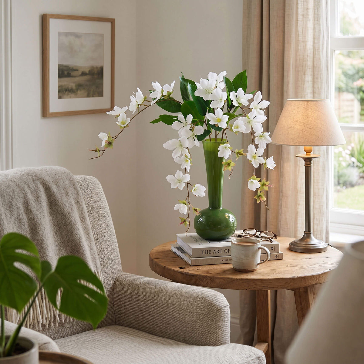 Faux jasmine flower arrangement on a bedroom table, bringing a calm and soothing atmosphere with soft lighting.